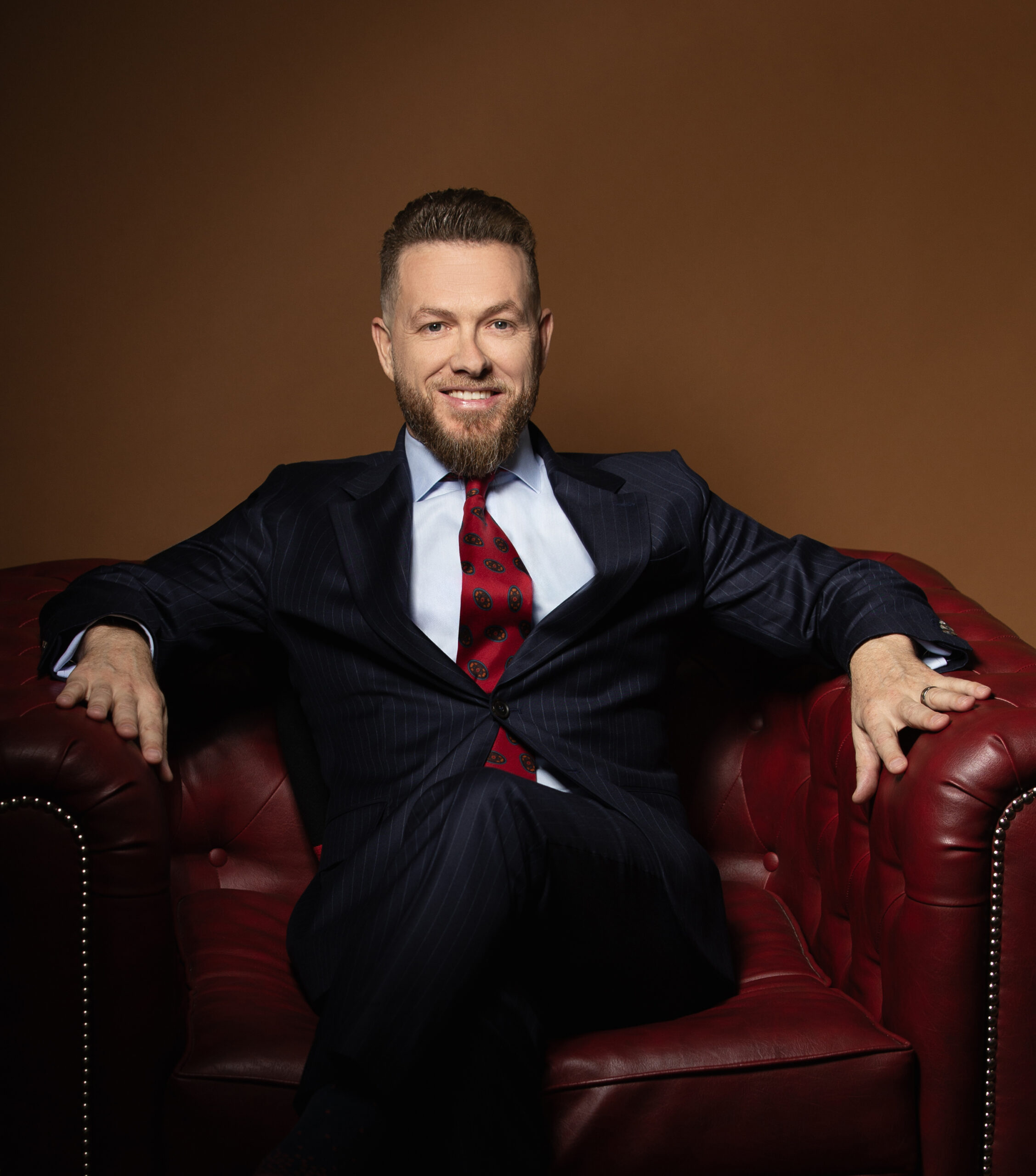 Gareth Noble seated in armchair